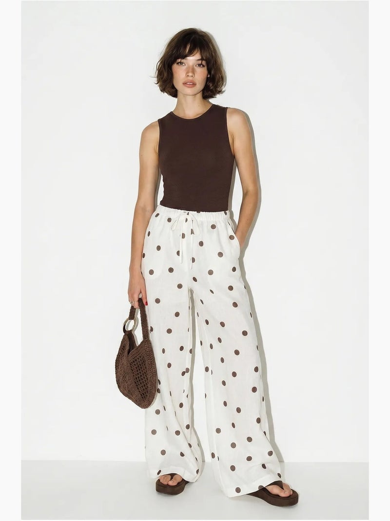 Pantalones de lunares de pernera ancha con cintura para anudar en la cintura lucci Crudo - Kiabi