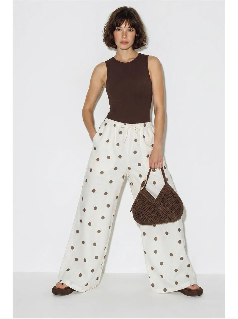 Pantalones de lunares de pernera ancha con cintura para anudar en la cintura lucci Crudo - Kiabi