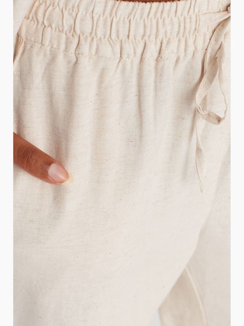 Pantalones de pernera ancha con cintura de cordón ajustable dilvin - Kiabi Pantalones de pernera ancha con cintura de cordón ajustable dilvin - Kiabi