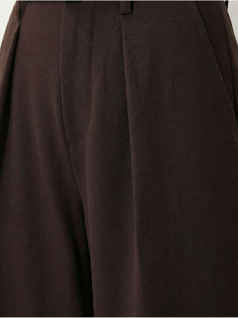 Pantalones de pernera ancha con pinzas y cinturón istanbul Marrón chocolate - Kiabi