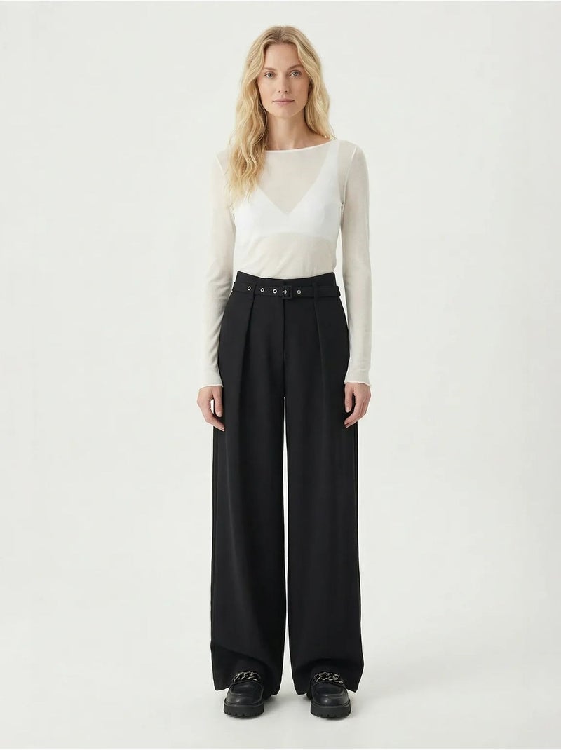 Pantalones de pernera ancha con pinzas y cinturón istanbul Negro - Kiabi