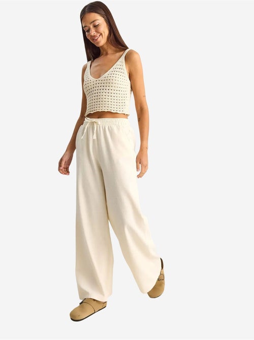 Pantalones de pernera ancha de algodón con cordón en la cintura lucci - Kiabi Pantalones de pernera ancha de algodón con cordón en la cintura lucci - Kiabi