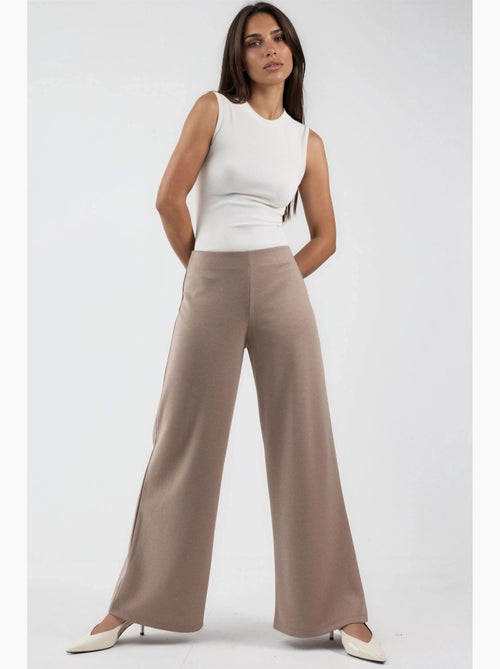 Pantalones de pernera ancha de talle alto busem - Kiabi Pantalones de pernera ancha de talle alto busem - Kiabi
