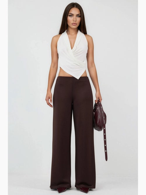 Pantalones de pernera ancha de talle alto busem - Kiabi Pantalones de pernera ancha de talle alto busem - Kiabi
