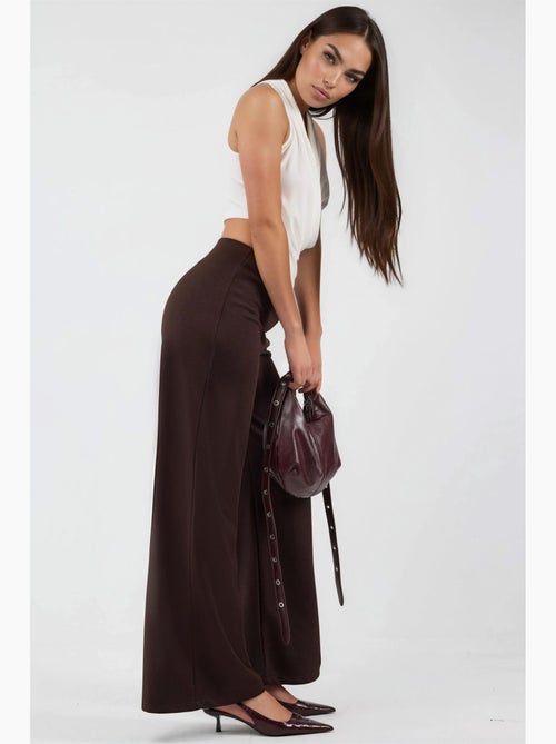 Pantalones de pernera ancha de talle alto busem - Kiabi Pantalones de pernera ancha de talle alto busem - Kiabi