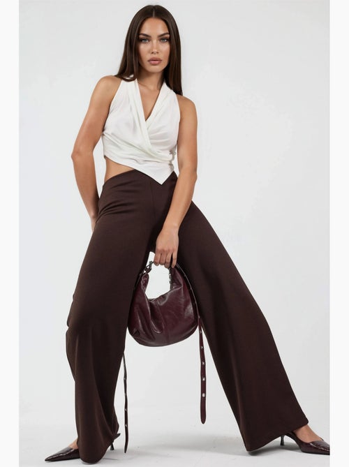 Pantalones de pernera ancha de talle alto busem - Kiabi Pantalones de pernera ancha de talle alto busem - Kiabi