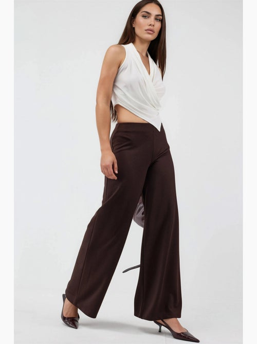 Pantalones de pernera ancha de talle alto busem - Kiabi Pantalones de pernera ancha de talle alto busem - Kiabi