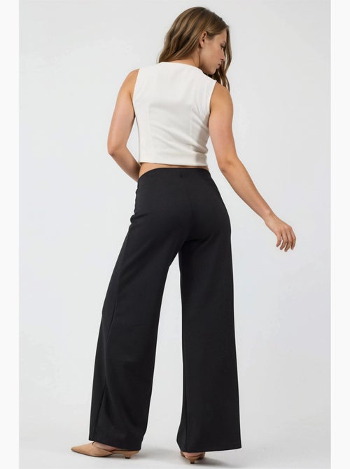 Pantalones de pernera ancha de talle alto busem - Kiabi Pantalones de pernera ancha de talle alto busem - Kiabi