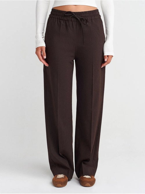 Pantalones de pernera ancha pull-on dilvin - Kiabi Pantalones de pernera ancha pull-on dilvin - Kiabi