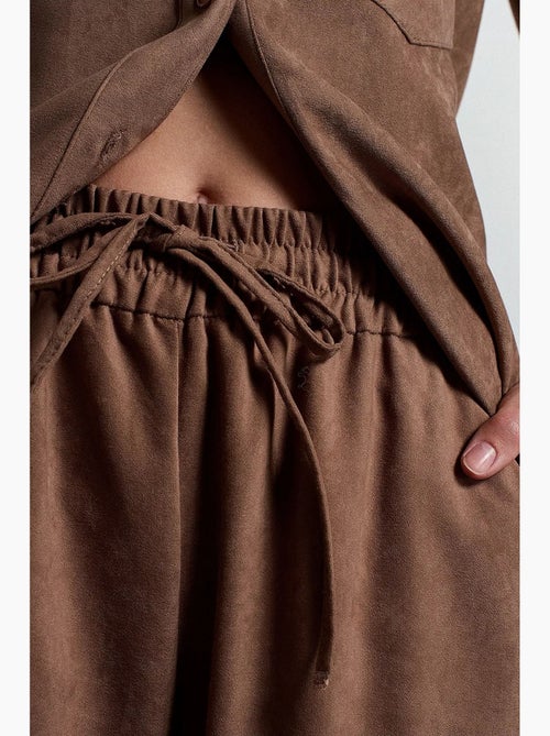 Pantalones de pernera ancha pull-on dilvin - Kiabi Pantalones de pernera ancha pull-on dilvin - Kiabi
