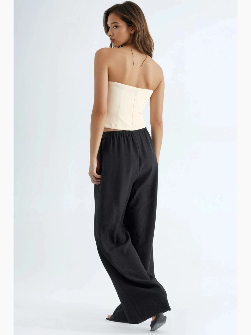 Pantalones de pierna ancha con cordón y bolsillos busem Negro - Kiabi