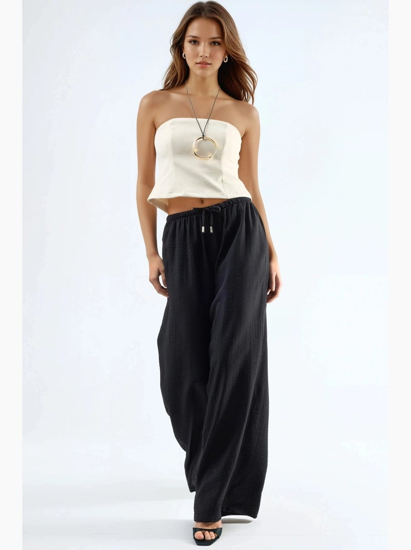 Pantalones de pierna ancha con cordón y bolsillos busem Negro - Kiabi