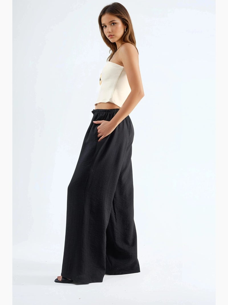 Pantalones de pierna ancha con cordón y bolsillos busem Negro - Kiabi