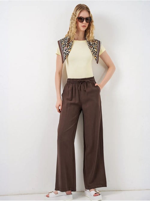 Pantalones de pierna ancha de talle alto con bolsillo bdart - Kiabi Pantalones de pierna ancha de talle alto con bolsillo bdart - Kiabi