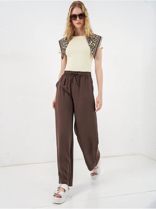 Pantalones de pierna ancha de talle alto con bolsillo bdart - Kiabi Pantalones de pierna ancha de talle alto con bolsillo bdart - Kiabi