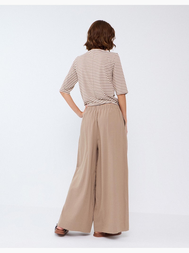 Pantalones de pierna ancha, mo fashion Beige - Kiabi