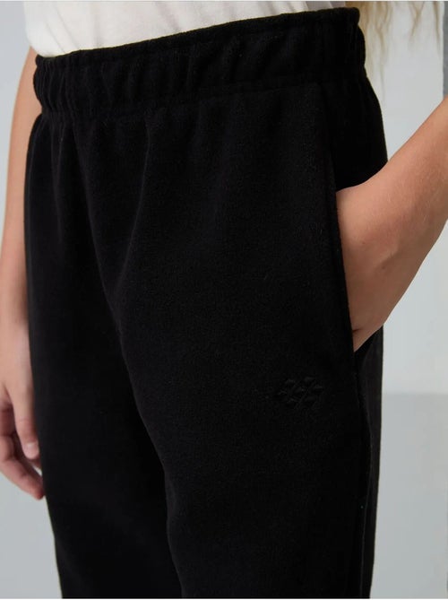 Pantalones de poliéster para jóvenes tommy - Kiabi Pantalones de poliéster para jóvenes tommy - Kiabi