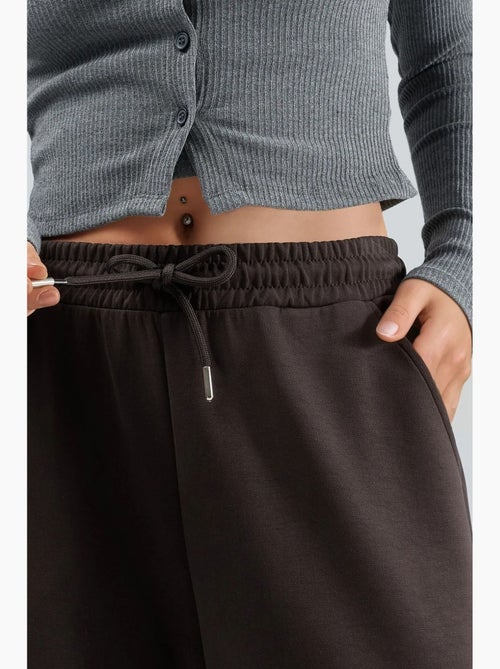 Pantalones de punto de pierna ancha y cintura alta busem - Kiabi Pantalones de punto de pierna ancha y cintura alta busem - Kiabi