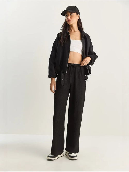 Pantalones de seersucker de cintura alta y pierna ancha lucci - Kiabi