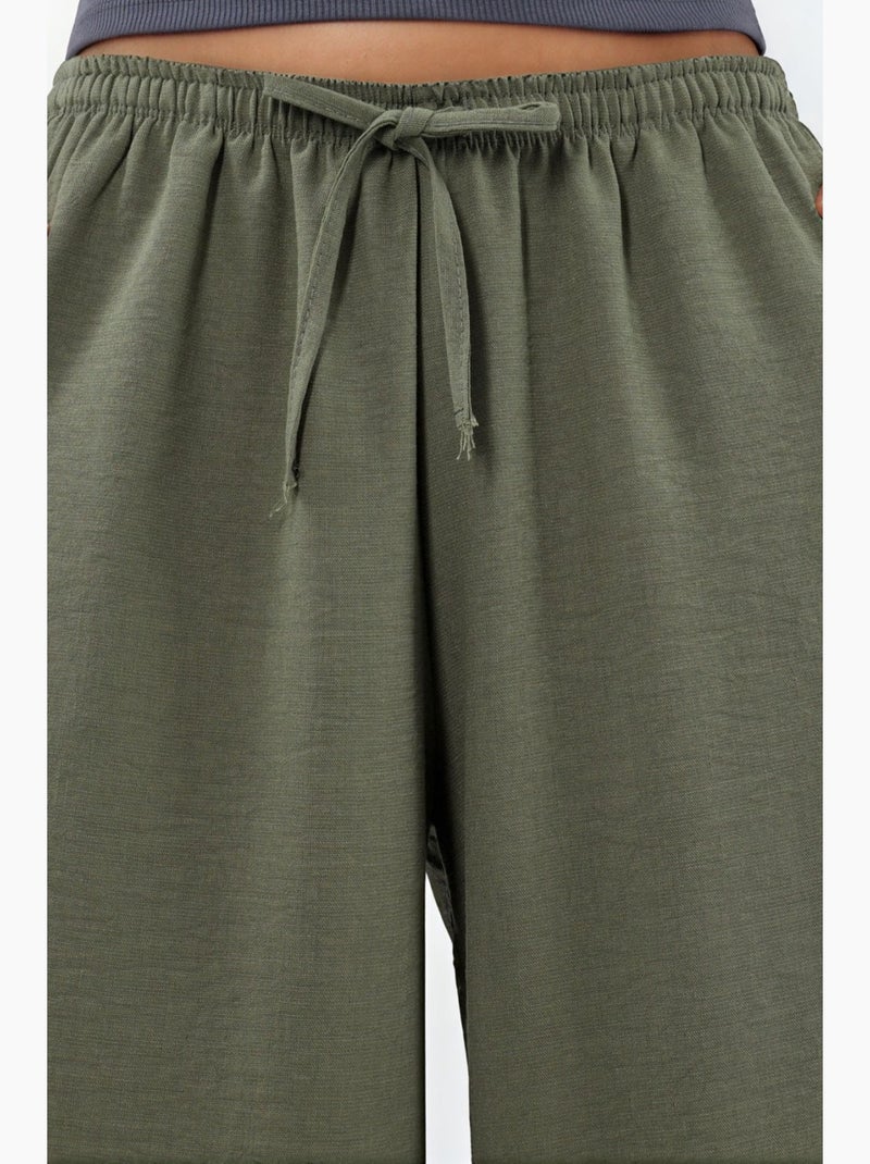 Pantalones de tejido de pierna ancha con cintura de cordón busem Verde - Kiabi
