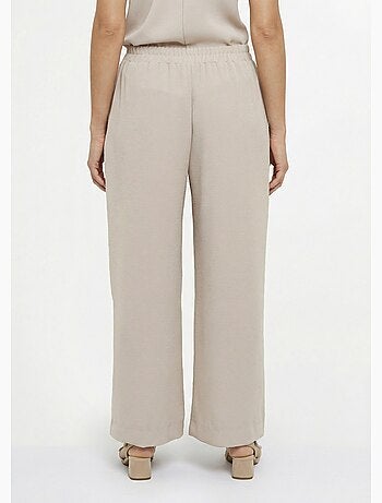 Pantalones de textura suave, atados a la cintura. - Afibel