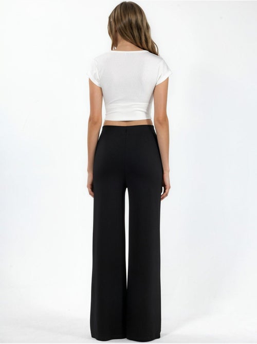 Pantalones de tiro alto de pernera recta con accesorio de piedra hiccup - Kiabi Pantalones de tiro alto de pernera recta con accesorio de piedra hiccup - Kiabi