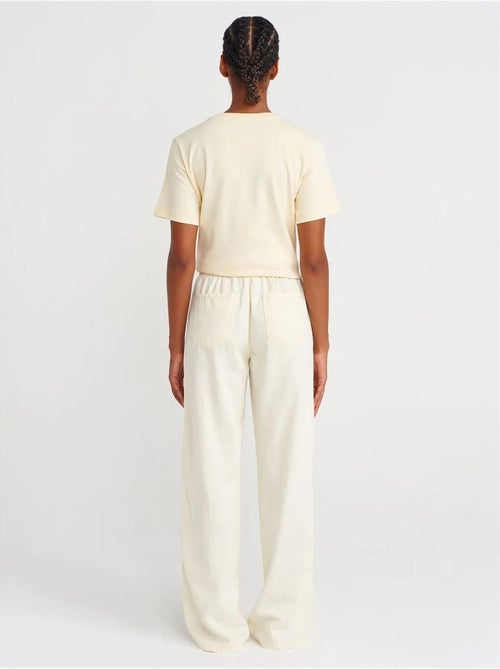 Pantalones de tiro alto y pernera ancha con cintura para anudar dilvin - Kiabi Pantalones de tiro alto y pernera ancha con cintura para anudar dilvin - Kiabi