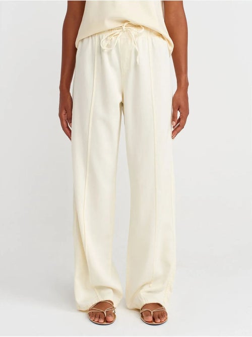 Pantalones de tiro alto y pernera ancha con cintura para anudar dilvin - Kiabi Pantalones de tiro alto y pernera ancha con cintura para anudar dilvin - Kiabi