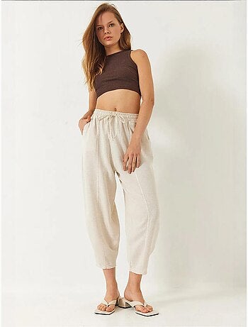 Pantalones de tiro caído con cintura elástica y detalle de bolsillo lucci