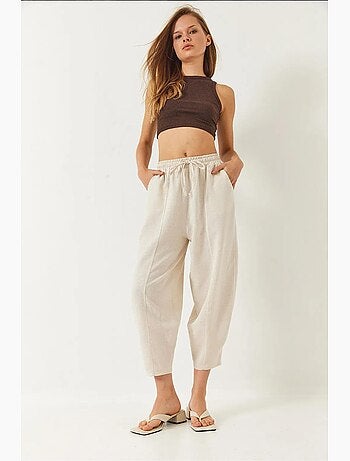 Pantalones de tiro caído con cintura elástica y detalle de bolsillo lucci