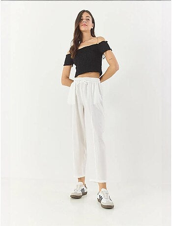 Pantalones de verano de corte zanahoria con cinturón y bolsillos lucci