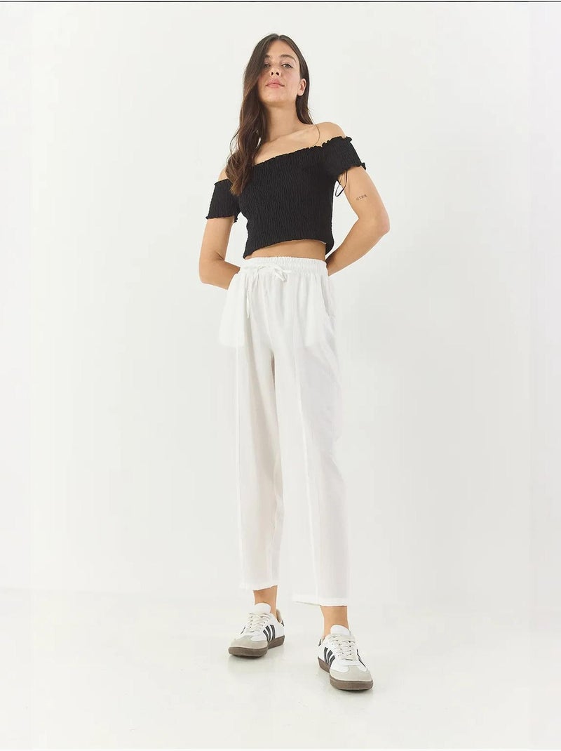 Pantalones de verano de corte zanahoria con cinturón y bolsillos lucci Blanco - Kiabi