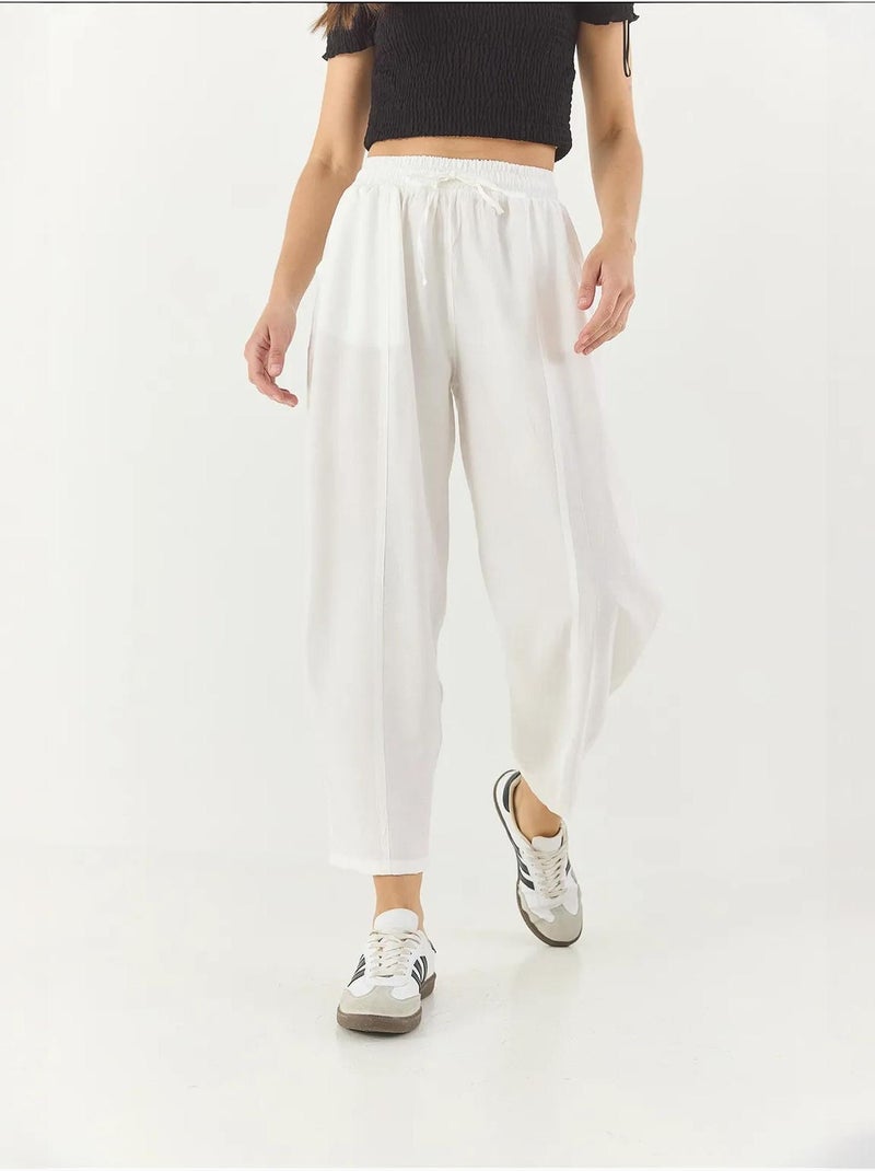 Pantalones de verano de corte zanahoria con cinturón y bolsillos lucci Blanco - Kiabi