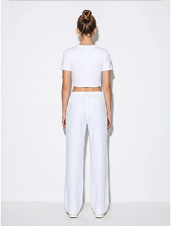 Pantalones de verano de lyocell con cintura elástica y detalle de bolsillo de bianco lucci