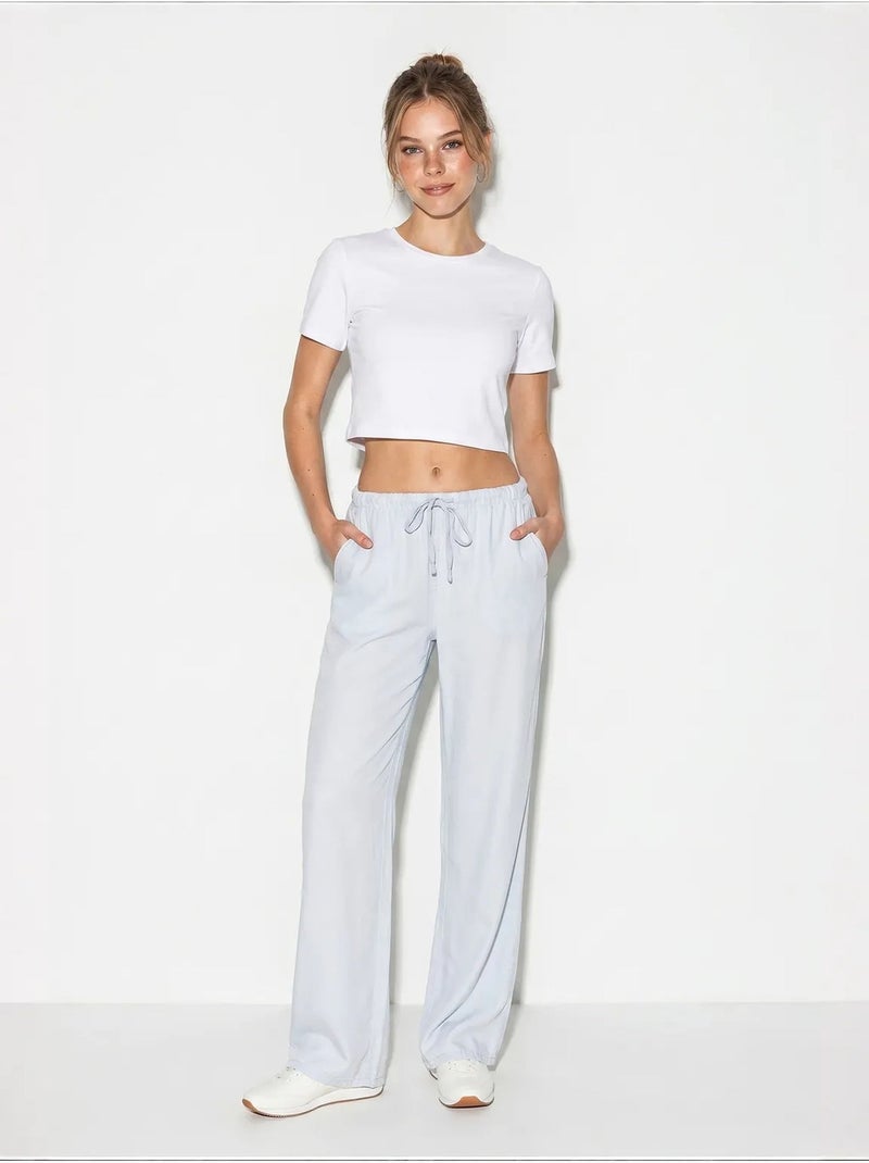 Pantalones de verano de lyocell con cintura elástica y detalle de bolsillo de bianco lucci Azul pastel - Kiabi