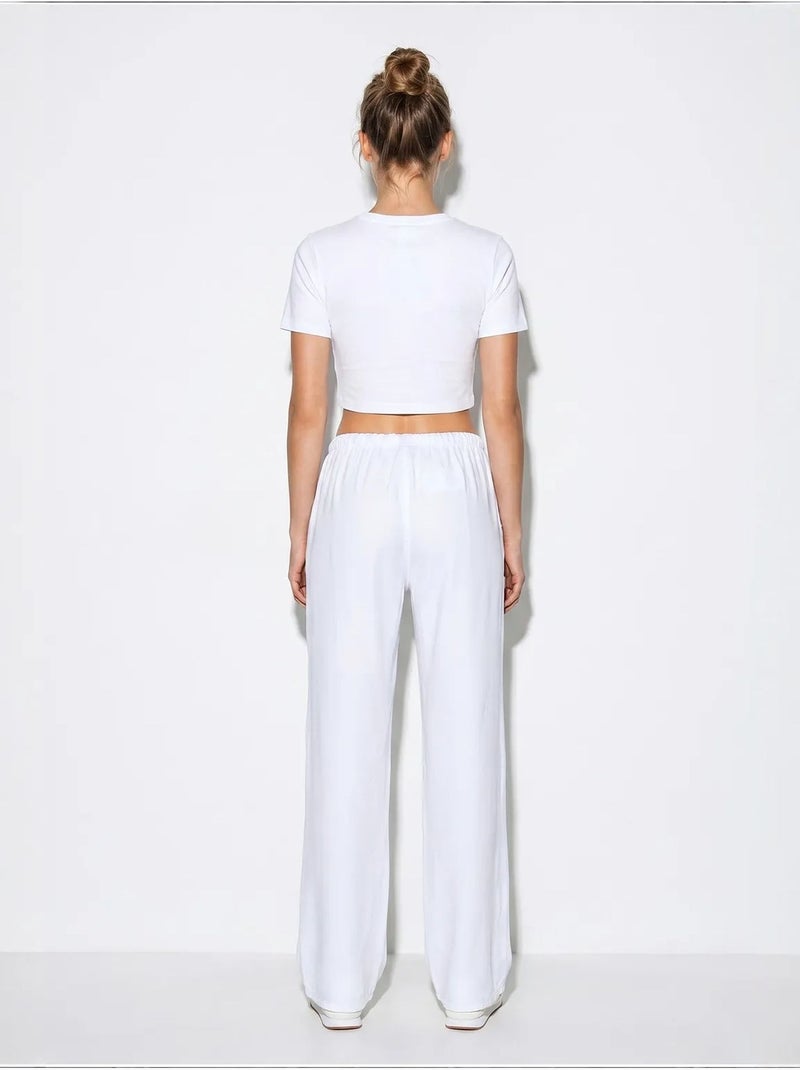 Pantalones de verano de lyocell con cintura elástica y detalle de bolsillo de bianco lucci Azul pastel - Kiabi