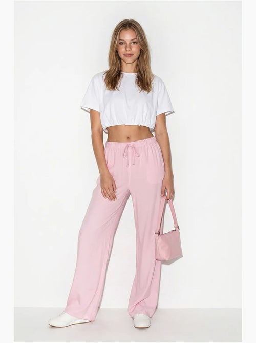 Pantalones de verano de lyocell con cintura elástica y detalle de bolsillo de bianco lucci - Kiabi Pantalones de verano de lyocell con cintura elástica y detalle de bolsillo de bianco lucci - Kiabi