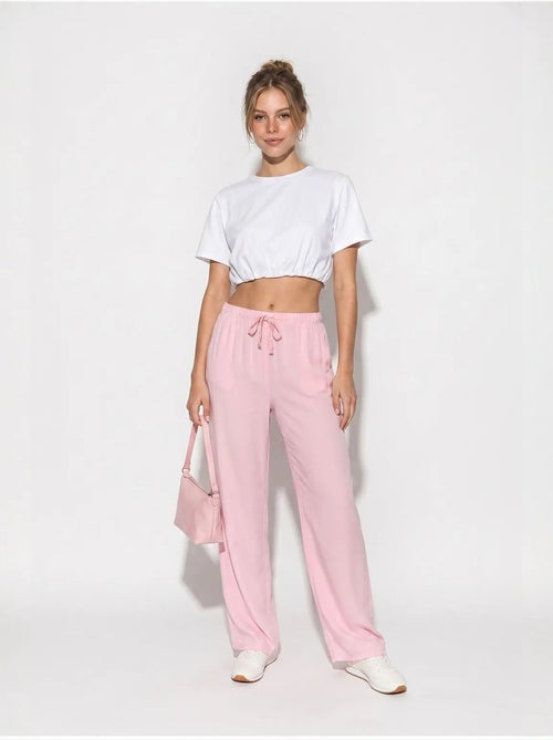 Pantalones de verano de lyocell con cintura elástica y detalle de bolsillo de bianco lucci - Kiabi Pantalones de verano de lyocell con cintura elástica y detalle de bolsillo de bianco lucci - Kiabi