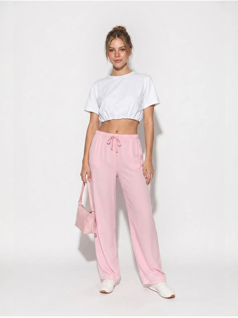 Pantalones de verano de lyocell con cintura elástica y detalle de bolsillo de bianco lucci Rosa - Kiabi