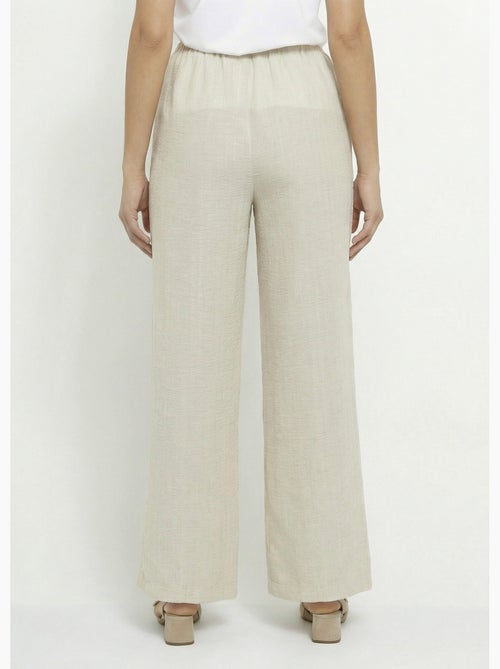 Pantalones de vestir a rayas con apariencia irregular - Afibel - Kiabi