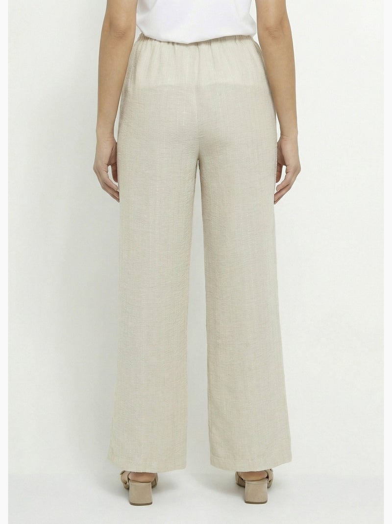 Pantalones de vestir a rayas con apariencia irregular - Afibel Beige - Kiabi