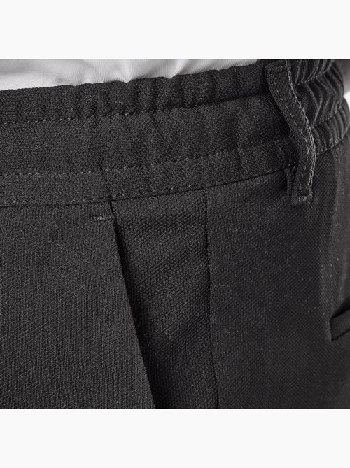 Pantalones de vestir con cordón ajustable moderno - Kiabi Pantalones de vestir con cordón ajustable moderno - Kiabi
