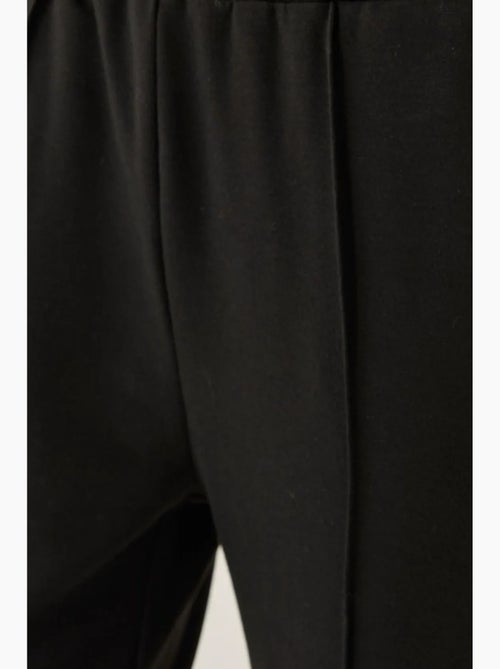 Pantalones deportivos acampanados hiccup - Kiabi