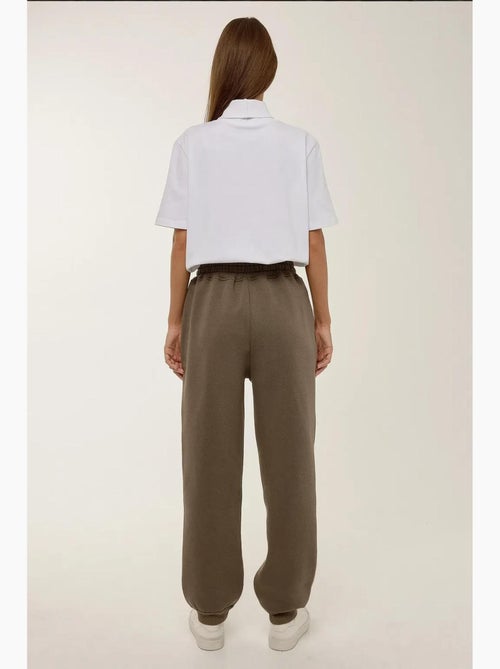 Pantalones deportivos básicos con cintura elástica hiccup - Kiabi Pantalones deportivos básicos con cintura elástica hiccup - Kiabi
