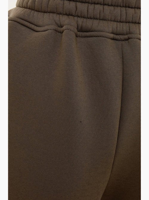 Pantalones deportivos básicos con cintura elástica hiccup - Kiabi Pantalones deportivos básicos con cintura elástica hiccup - Kiabi