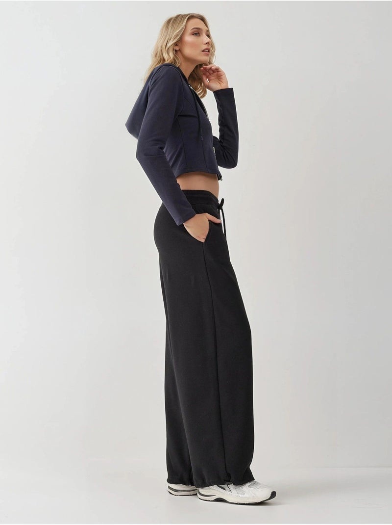 Pantalones deportivos básicos con realce y corte barril hiccup Negro - Kiabi