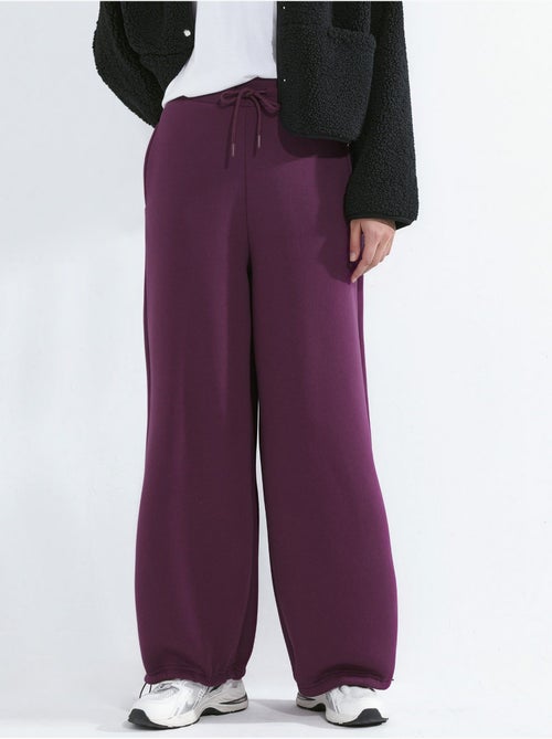 Pantalones deportivos básicos con realce y corte barril hiccup - Kiabi Pantalones deportivos básicos con realce y corte barril hiccup - Kiabi