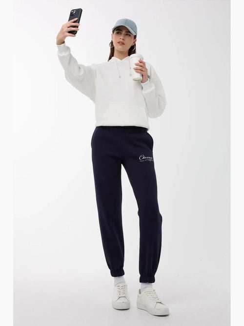 Pantalones deportivos con cintura elástica hiccup - Kiabi Pantalones deportivos con cintura elástica hiccup - Kiabi