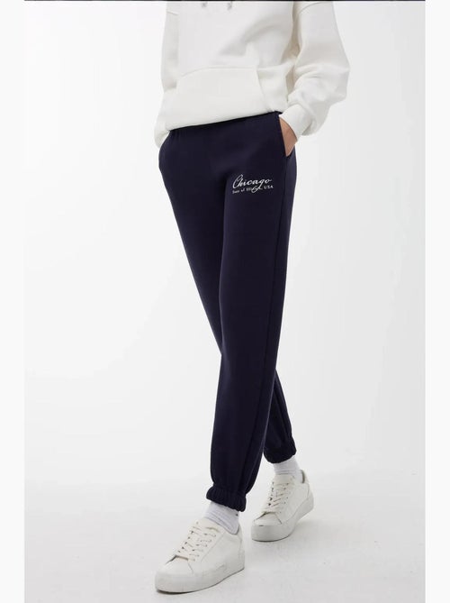 Pantalones deportivos con cintura elástica hiccup - Kiabi Pantalones deportivos con cintura elástica hiccup - Kiabi