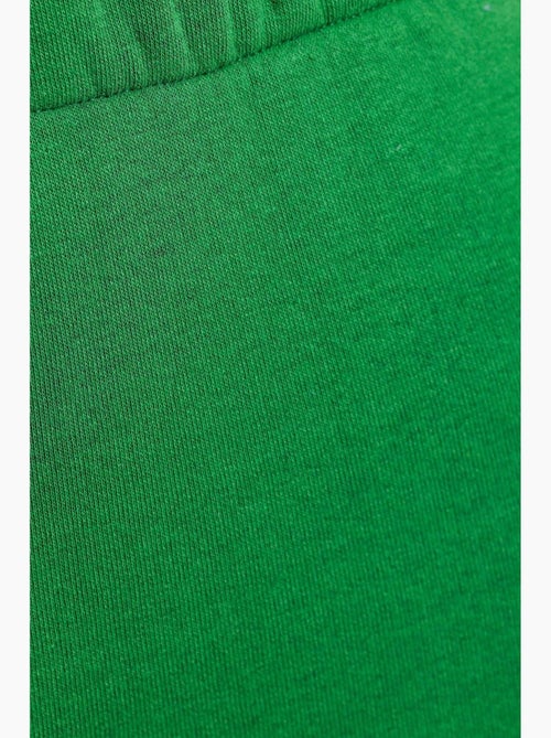 Pantalones deportivos de cintura alta con abertura y cremallera hiccup - Kiabi Pantalones deportivos de cintura alta con abertura y cremallera hiccup - Kiabi